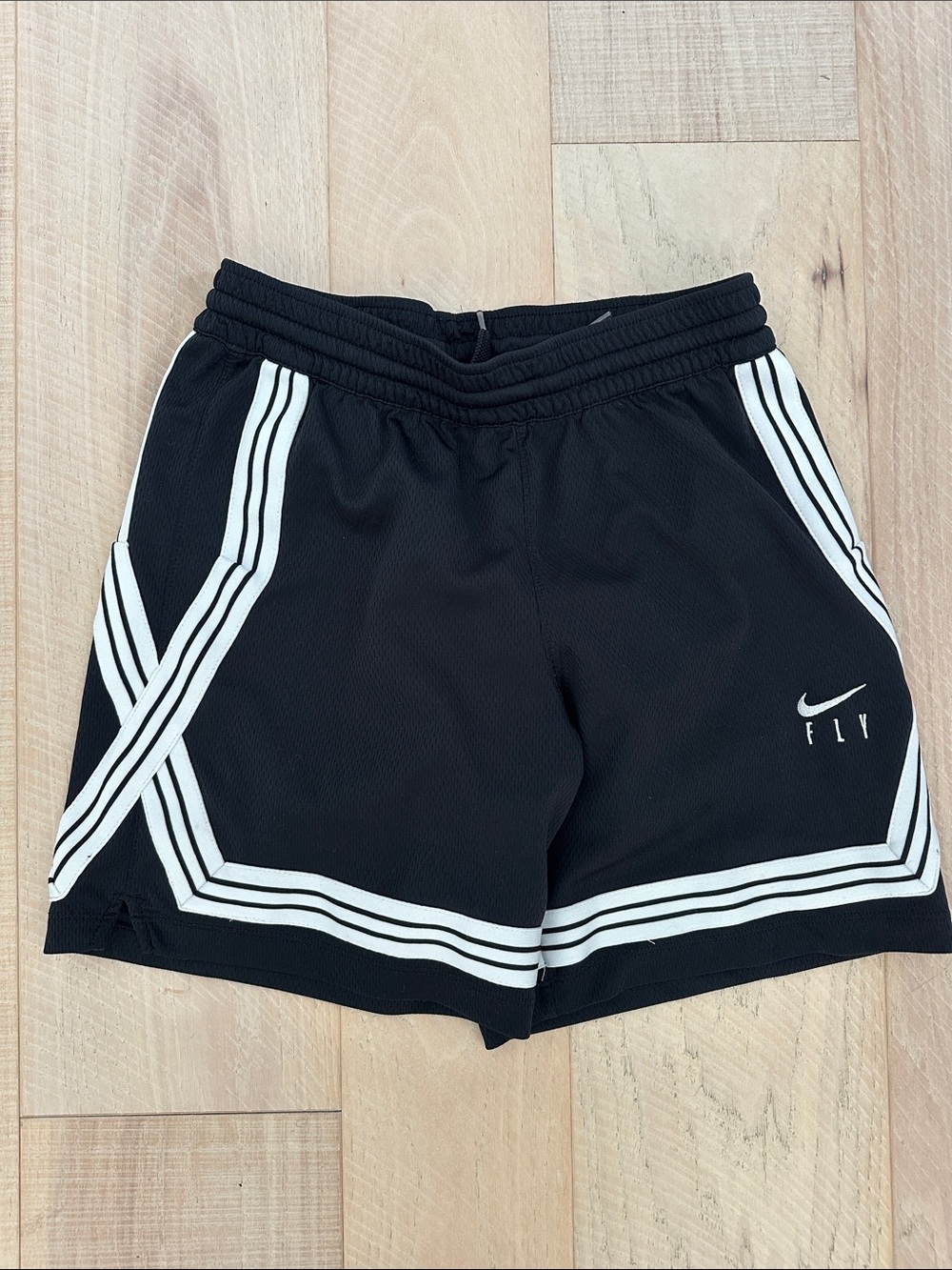 Nike Black Athletic Shorts with White Stripe Detailing